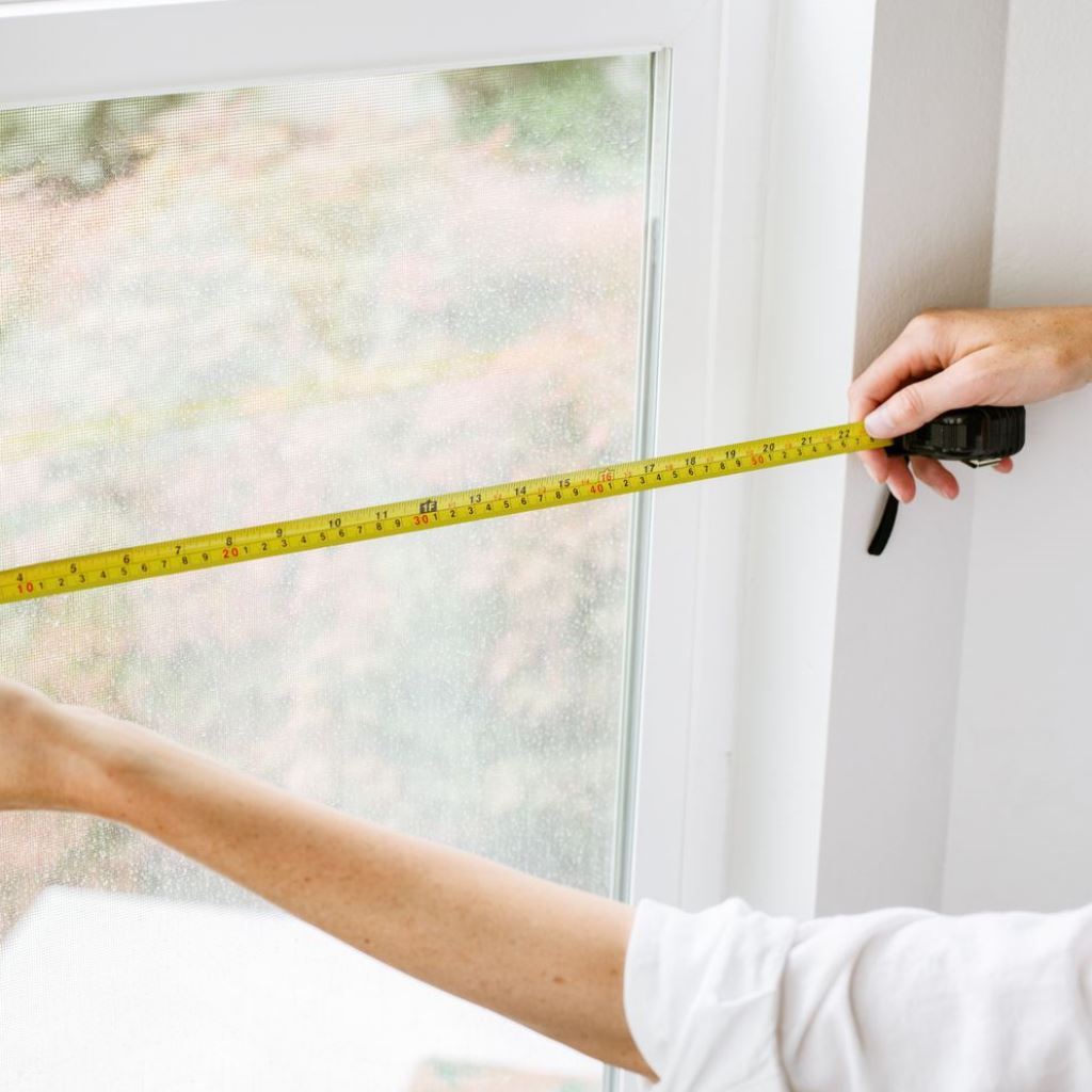 Measuring A Window With A Tape Measure
